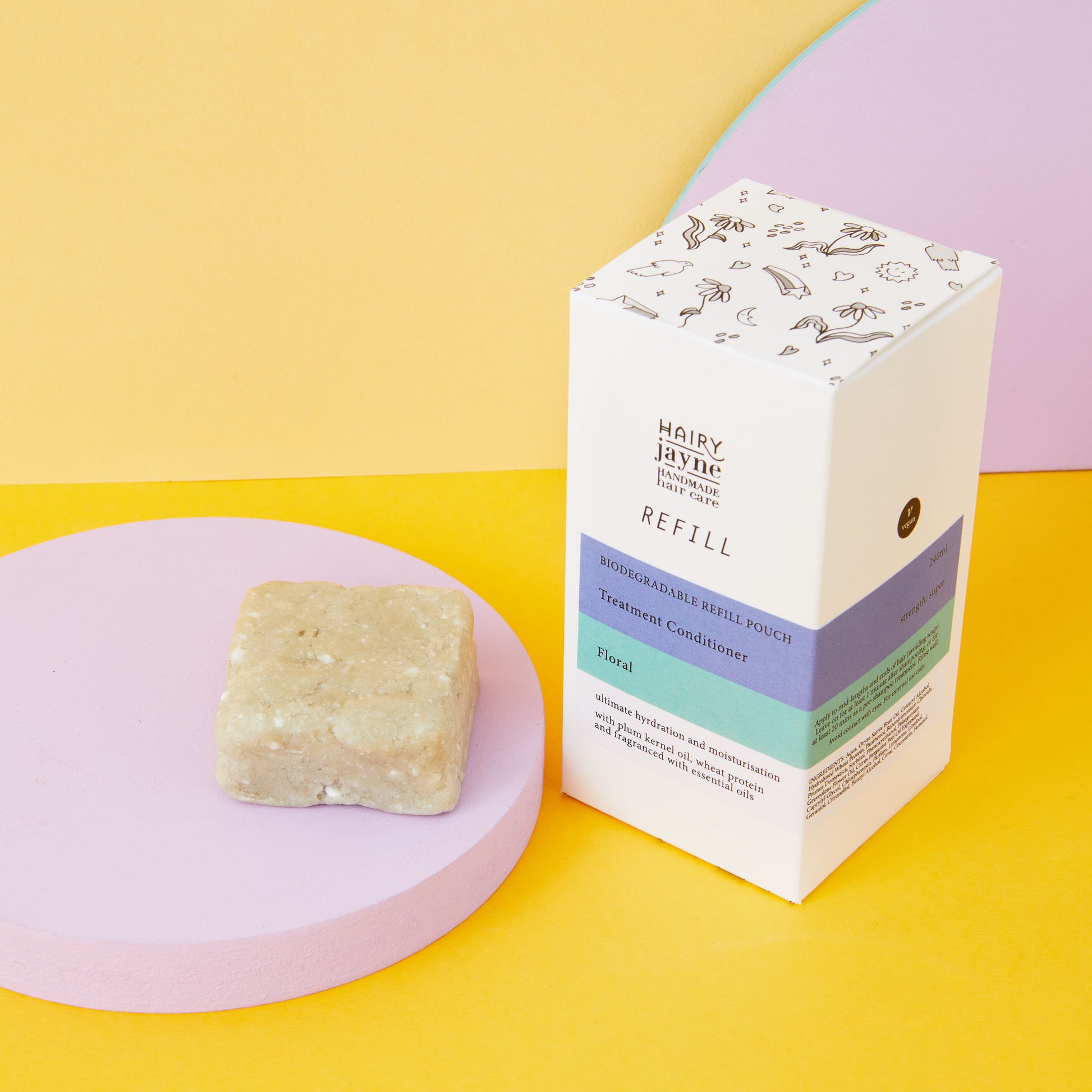Naked shampoo bar and conditioner refill packaging on a colorful background