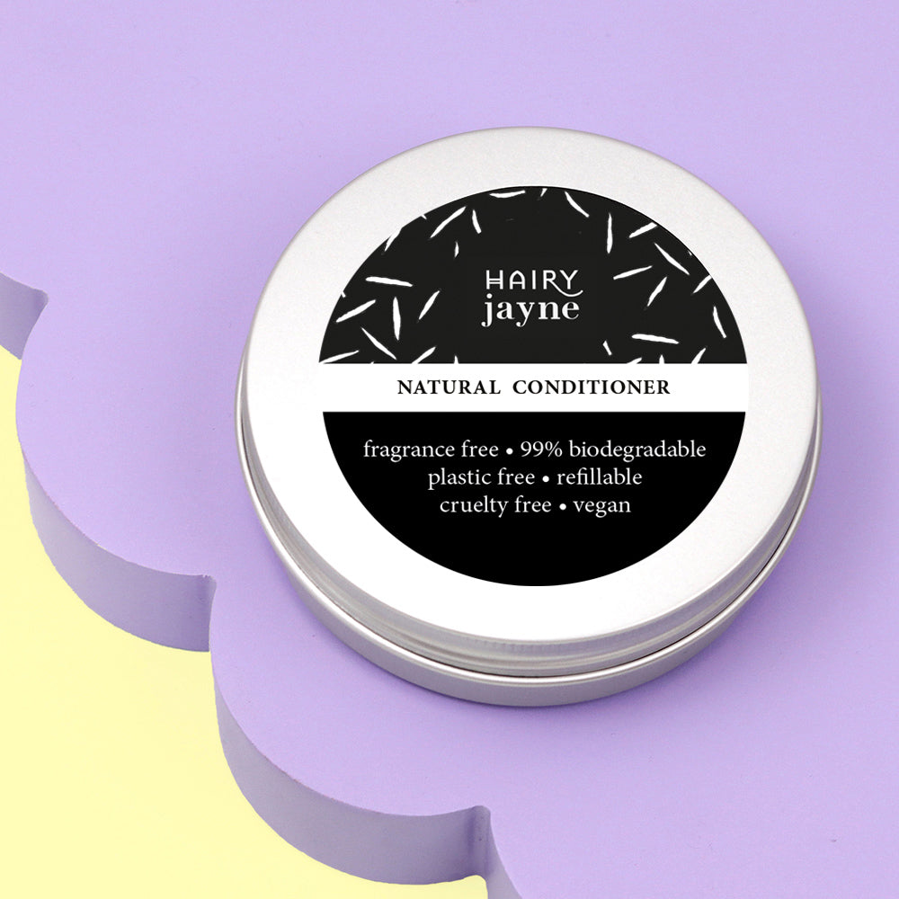 Hairy Jayne natural conditioner base in a tin on a purple background